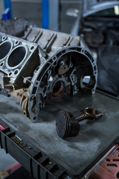 Close-up view of a car engine highlighting automotive parts and components for repair